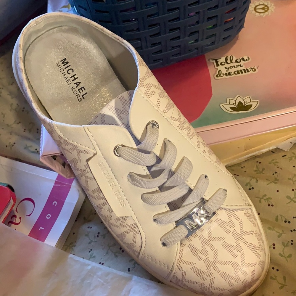 Pair of MK slip on shoes
